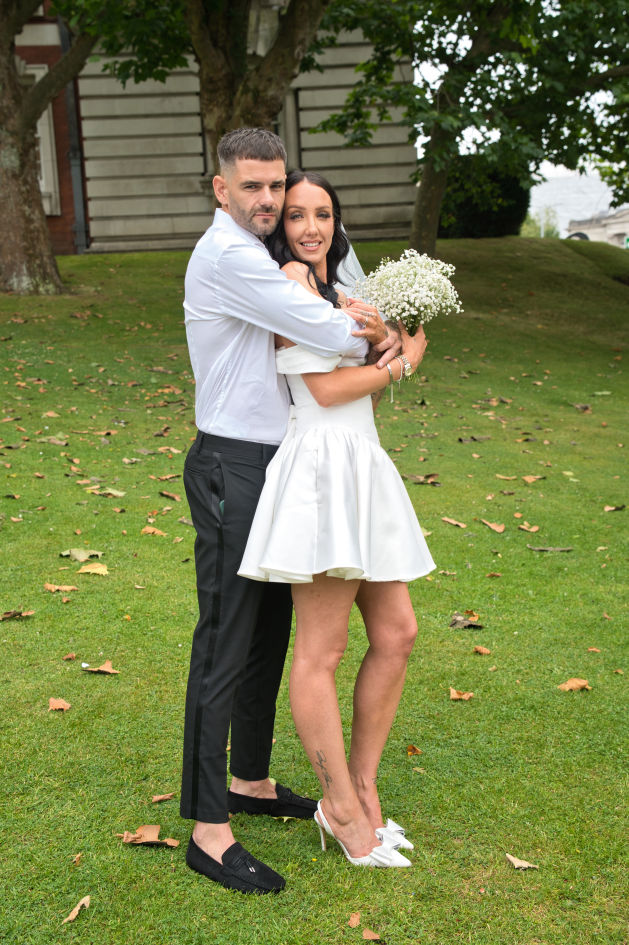 Bride and groom outside Stockport town Hall