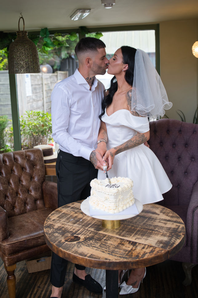 bride and groom at there wedding meal in bramhall.  